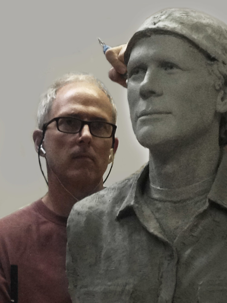 Richard Becker sculpting the clay of Ron Howard's bust in his Poway, California studio. 