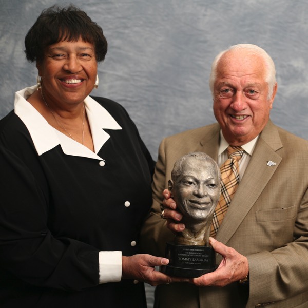 Tom Bradley award being given to Tommy Lasorda by Lorraine Bradley. Dodgers Stadium