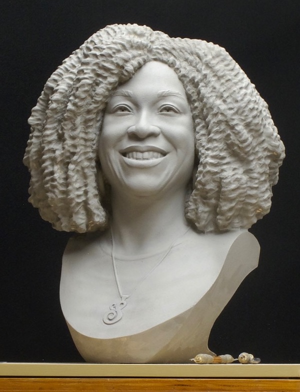 Final clay sculpt of Shonda Rhimes in studio with sculpting tools