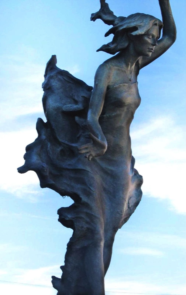 Bronze commissioned sculpture of angelic figure for Good Samaritan Garden. By San Diego sculptor Richard Becker