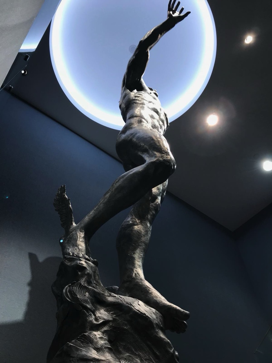 View from below of 17ft tall sculpture of Mercury at Los Angeles Athletic Club. Commission Sculpture.