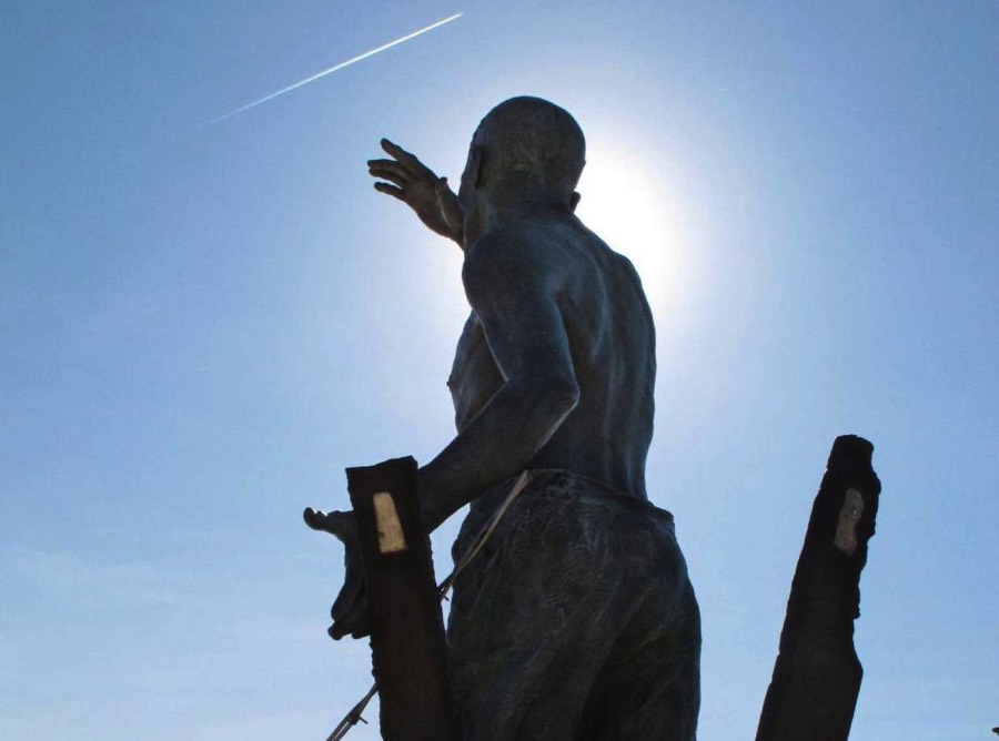 Monumental-Bronze-and-stainless-sculpture-of-prinsoner-of-war-at-moment-of-liberation-Miramar-National-Cemetery