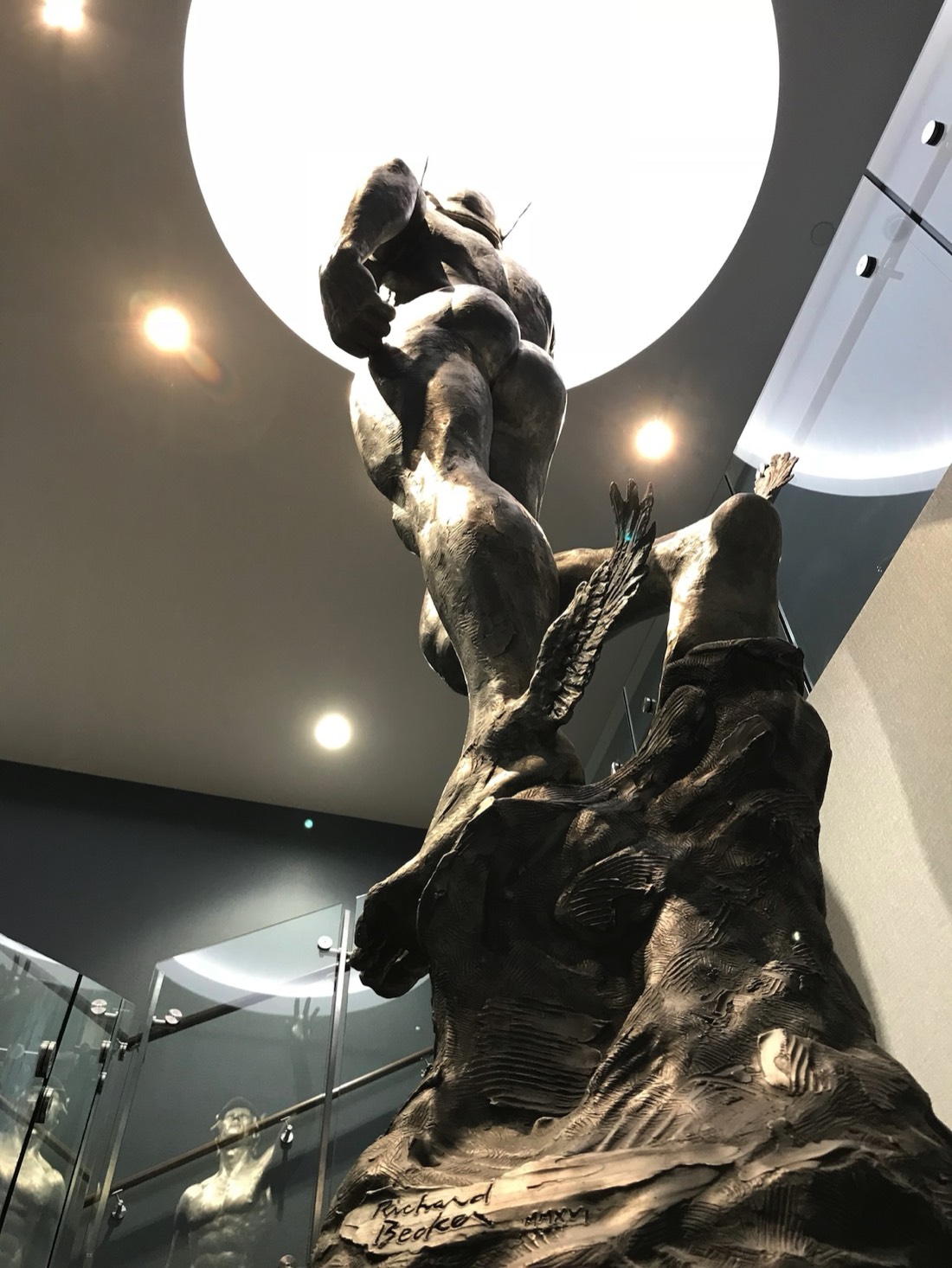 Mercury sculpture integrated within glass stair installation at Los Angeles Athletic Club 