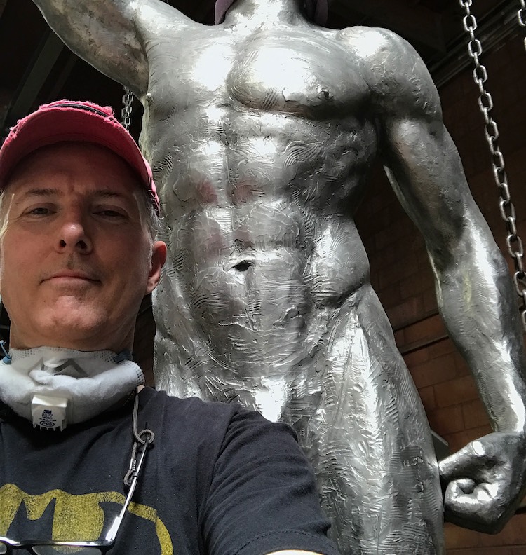 Richard takes a break from grinding and sanding on the heroic statue of Mercury for the Los Angeles Athletic Club.