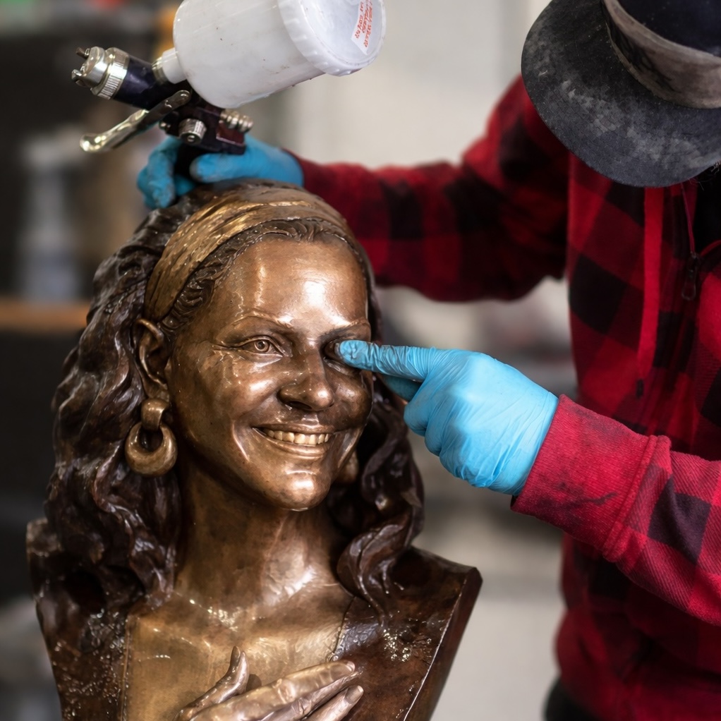 Finishing and patina application on Debbie Allen bronze portrait at The Big New foundry in Vernon, California