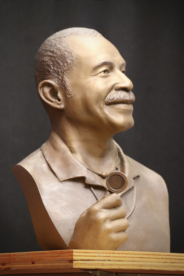 Donald A. Morgan Cinematographer  bust with the filter he uses to check lighting.  