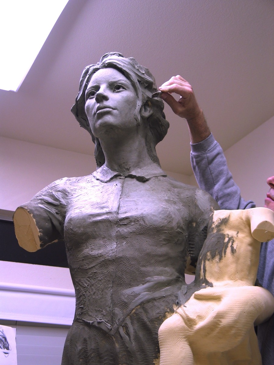 Sculpting clay over foam armature in Richard becker studio of pioneer sculpture. 